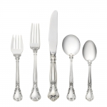 Chantilly Sterling Five Piece Place Setting with Cream Soup Spoon Finely crafted with the graceful elegance associated with 18th Century France, this stately pattern was first introduced in 1895. The intricate design is embellished with a cascade of deeply carved borders showcasing a slender raised central panel along the handle and a more substantial open panel that can be monogrammed near the tip, which is crowned with a delicate fleur de lis. A stunning addition to traditional and formal interiors, this regal pattern will turn every meal into an event.

Polish your sterling silver once or twice a year, whether or not it has been used regularly. Hand wash and dry immediately with a chamois or soft cotton cloth to avoid spotting.
